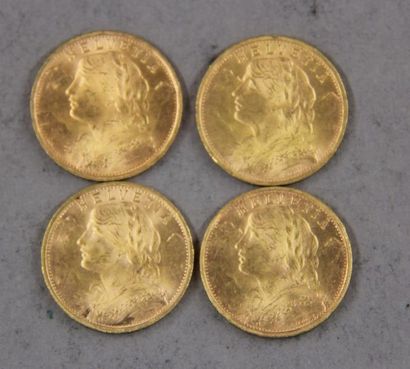 null *Quatre pièces de 20 F Suisse en or