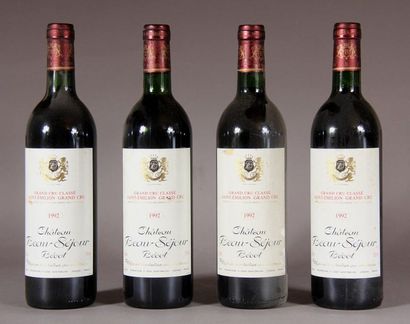 null 4 	bouteilles 	Château 	BEAU-SEJOUR-BECOT, 1° Grand cru 	St-Émilion 	1992