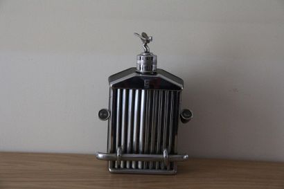null Alcohol bottle-music box in the shape of a Rolls Royce grille
H: 24 cm.