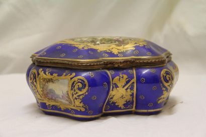 null Covered candy box in polychrome and gilded porcelain decorated with a mother...