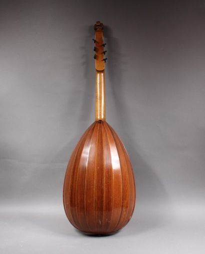 null GOLDKLANG
Veneer mandolin, carved handle of a woman's bust, rounded bottom,...
