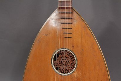 null GOLDKLANG
Veneer mandolin, carved handle of a woman's bust, rounded bottom,...