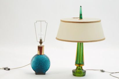 null *Two lamp bases, one in moulded blue glass, metal frame, the other in green...