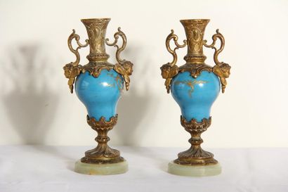 null *Pair of two-handled ceramic vases? Blue enamelled and gilded, bronze frame,...