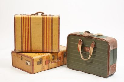 null *INNOVATION - LANCEL
- Deux valises en toile imperméable beige et rayures et...