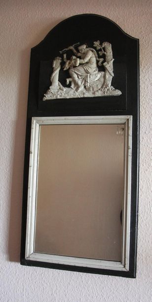 null Black and white lacquered wood trumeau with relief decoration of an Antique...