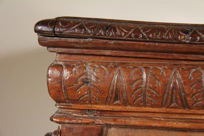 null *Natural wooden chest with panels carved with eagles and cherubs, antique elements
H...
