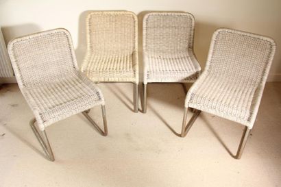 null *Four chairs in chromed metal, seat in woven plastic (rust)