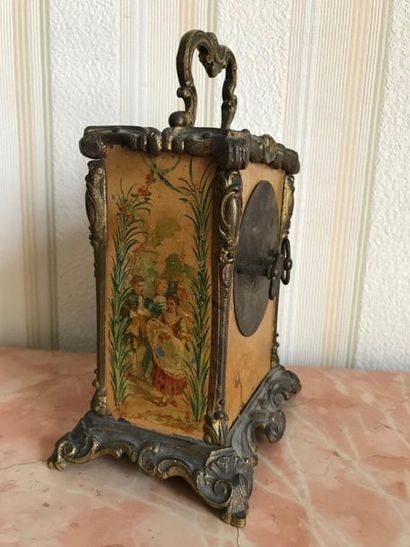 null Small clock in bronze and sheet metal painted with characters, circa 1900
H:...