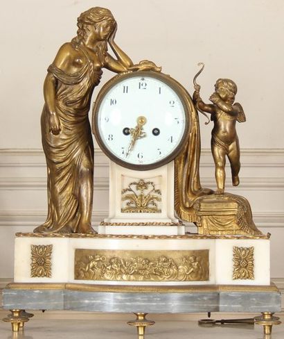 null Bronze, white and blue marble mantel set including a clock decorated with a...