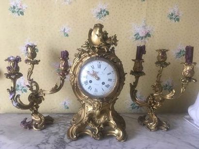 null Gilded bronze mantel set with rocaille decoration including a clock, LE ROY...
