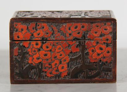 null Rectangular box in natural wood with relief decoration of red tinted flowers,...
