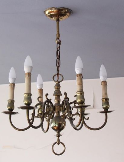null Dutch style brass chandelier with six light arms
H: 71 cm.