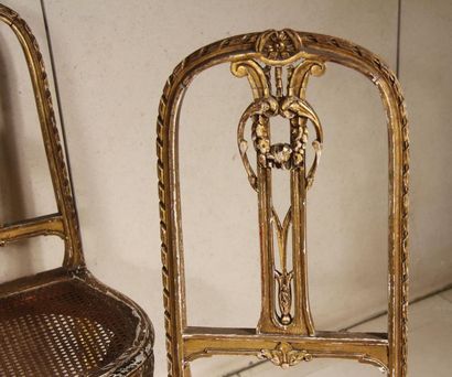 null Four caned chairs with straight openwork backrest in gilded wood (accidents,...