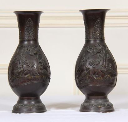Pair of patinated bronze vases with relief...