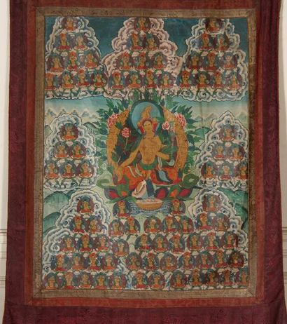 null Tangka peint dans un entourage en tissus, Népal XXème s.
97 x 70 cm.