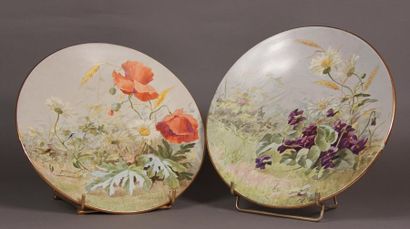 null Six polychrome earthenware plates decorated with flowers and figures FC.
Attached...