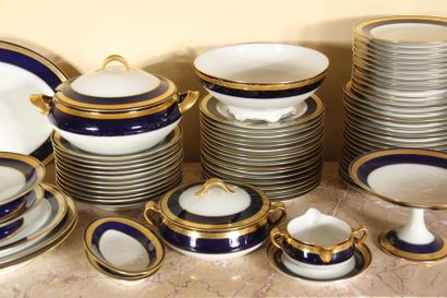 null HAVILAND
White porcelain dinner service part with dark blue marli and gold border...