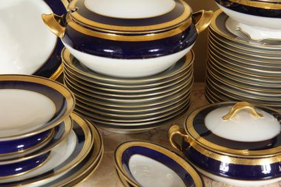 null HAVILAND
White porcelain dinner service part with dark blue marli and gold border...