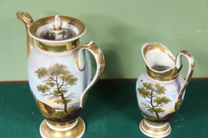 null Teapot and jug on a polychrome porcelain pedestal with landscape decoration,...