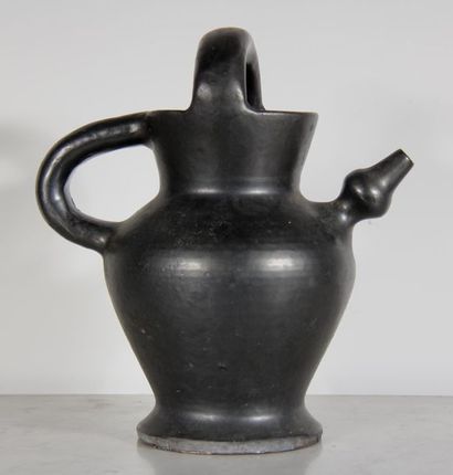 null Robert PICAULT (1919-2000)
Ceramic pitcher with black glaze, signed.
H : 31...