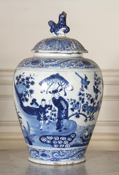 null DELFT XIXth c.
Blue-white earthenware covered baluster vase with Chinese decoration
H...