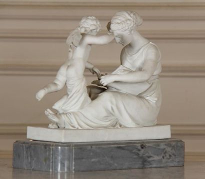 null Biscuit sculpture representing a seated woman reading and a cherub, counter...