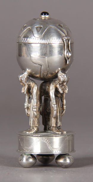 null 875°/°° silver bessamin box in the shape of a globe supported by three rabbis...