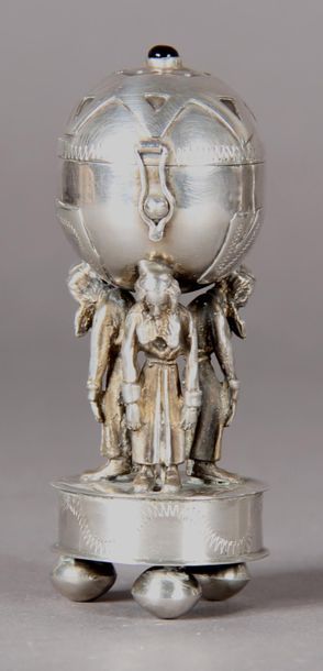 null 875°/°° silver bessamin box in the shape of a globe supported by three rabbis...