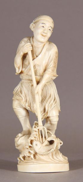 null Ivory okimono, representing a trident fisherman. Signed with a red stamp. 
Japan,...