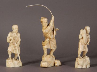 null Lot comprising two ivory okimono, one representing a figure wearing a bow, the...
