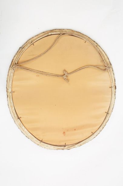 null *Line VAUTRIN (1913-1997
)Ovalized mirror in talosel and surrounded by small...