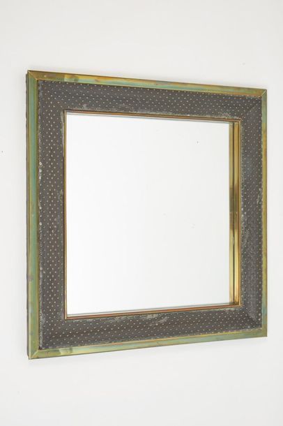 null *Jacques ADNET (1900-1984
)Mirror with square body with a brass structure embedded...