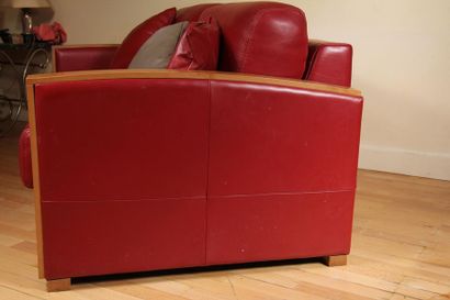 null Two-seater sofa and a swivel armchair in red leather and natural wood, 1930s...