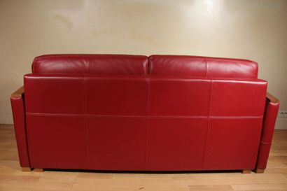 null Two-seater sofa and a swivel armchair in red leather and natural wood, 1930s...