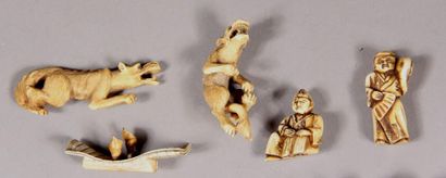 null Set of twelve ivory netsuke representing characters, and two statuettes representing...