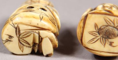 null Set of twelve ivory netsuke representing characters, and two statuettes representing...