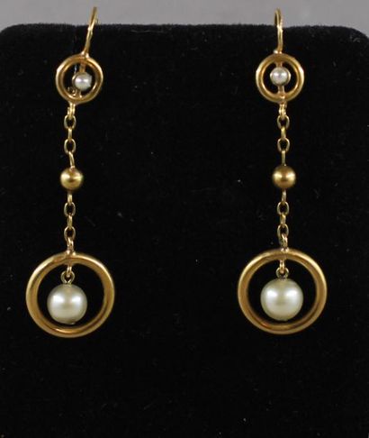 *Pair of 18k yellow gold and pearl sleepers,...
