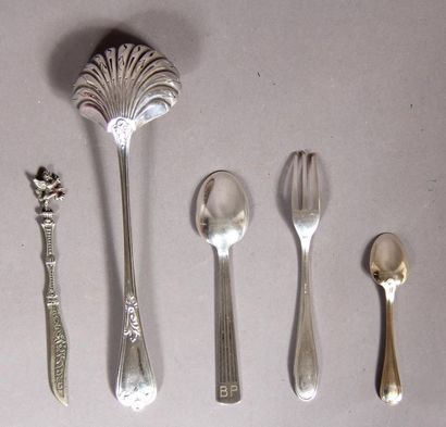 null Set of mismatched metal cutlery