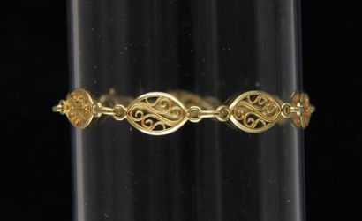 null Bracelet en or jaune 18k à maillons ovales filigrannés, pds : 7,7 g.