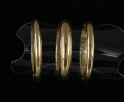 Three rings in 18k yellow gold, weights:...