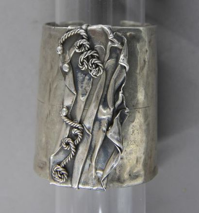 null - Silver cuff with folded elements decoration, pds: 123 g. 
 - Rigid articulated...