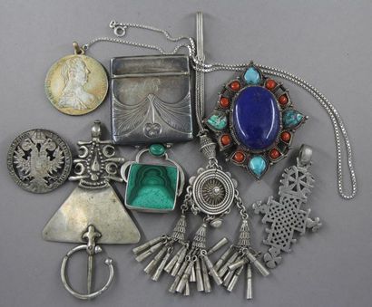 Silver lot: - four pendants: pds: 24-52-24-28...