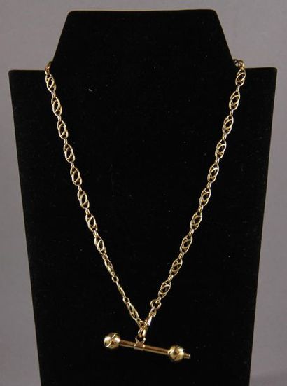 null Chain and watch key in 18k yellow gold, weight: 21.1 g.