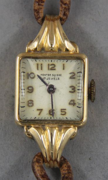 null *Lady's watch with rectangular case in 18k yellow gold, Swiss workmanship, rough...