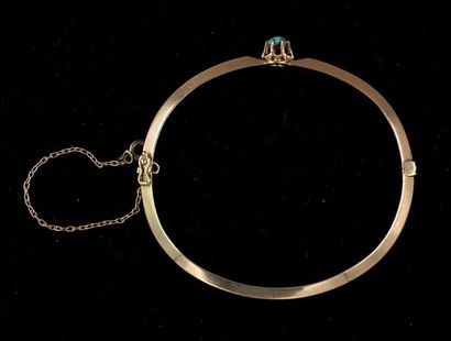 null *Hard-jointed rigid bracelet in 14k yellow gold set with half a turquoise pearl,...