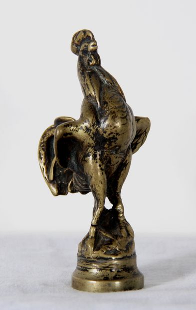 null *Sculpture en bronze en forme de coq

H : 10,5 cm.