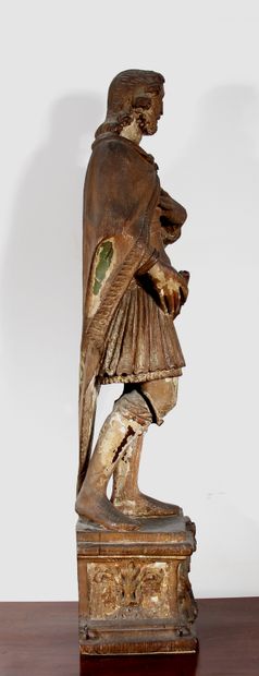 null *Ecole du XVIIème s. 

Portrait d'un Saint en pied

Sculpture en bois sur un...