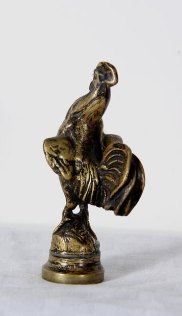 null *Sculpture en bronze en forme de coq

H : 10,5 cm.