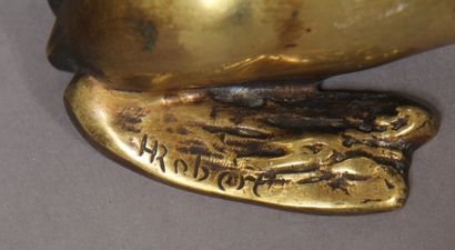 null H. ROBERT

Paire de serre-livres en bronze et ivoirine en forme d'otarie jonglant...